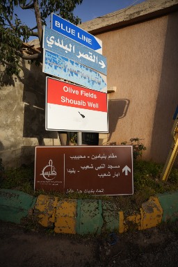 Deliveries are reaching communities near the Blue Line—where tension is daily life and families remain among the most vulnerable.