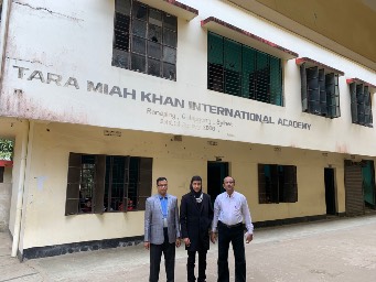 The school’s headteacher (left), me (middle) and the general manager of the school (right).